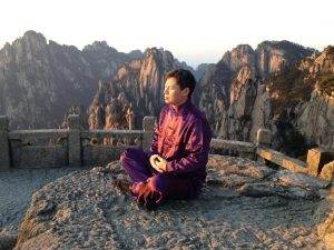 Dr. Tan meditating
