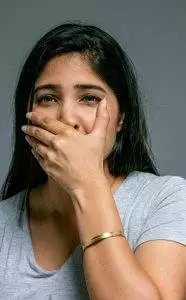 Stomach pain, nausea, and belching can be signs of gastroparesis.