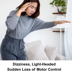 acupuncture for fainting, dizziness, syncope - woman holding hand to her head, unsteady
